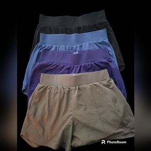 4 pairs of Womens Tek Gear Workout Shorts